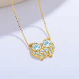 round aquamarine gold diamond necklace pendent