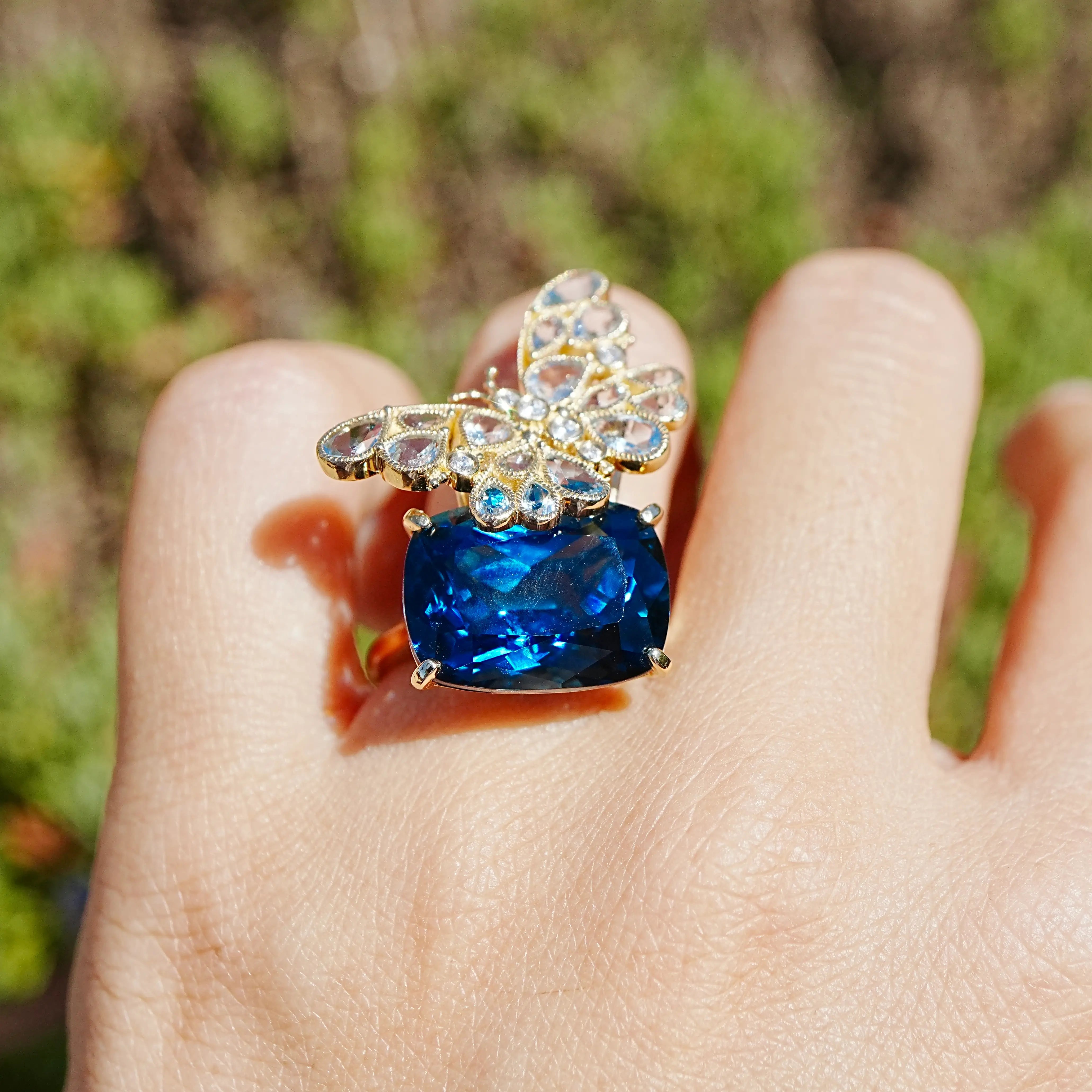 Natural Aquamarine & Diamond Butterfly on 13.4ctw London Blue Topaz Cocktail Ring in 14k yellow gold