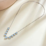 Harmony 4.8ctw Aquamarine Graduated Heart Station Necklace 14k white gold