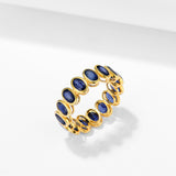 Royal Blue Oval Sapphire Eternity Band