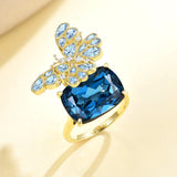 Natural Aquamarine & Diamond Butterfly on 13.4ctw London Blue Topaz Cocktail Ring in 14k yellow gold